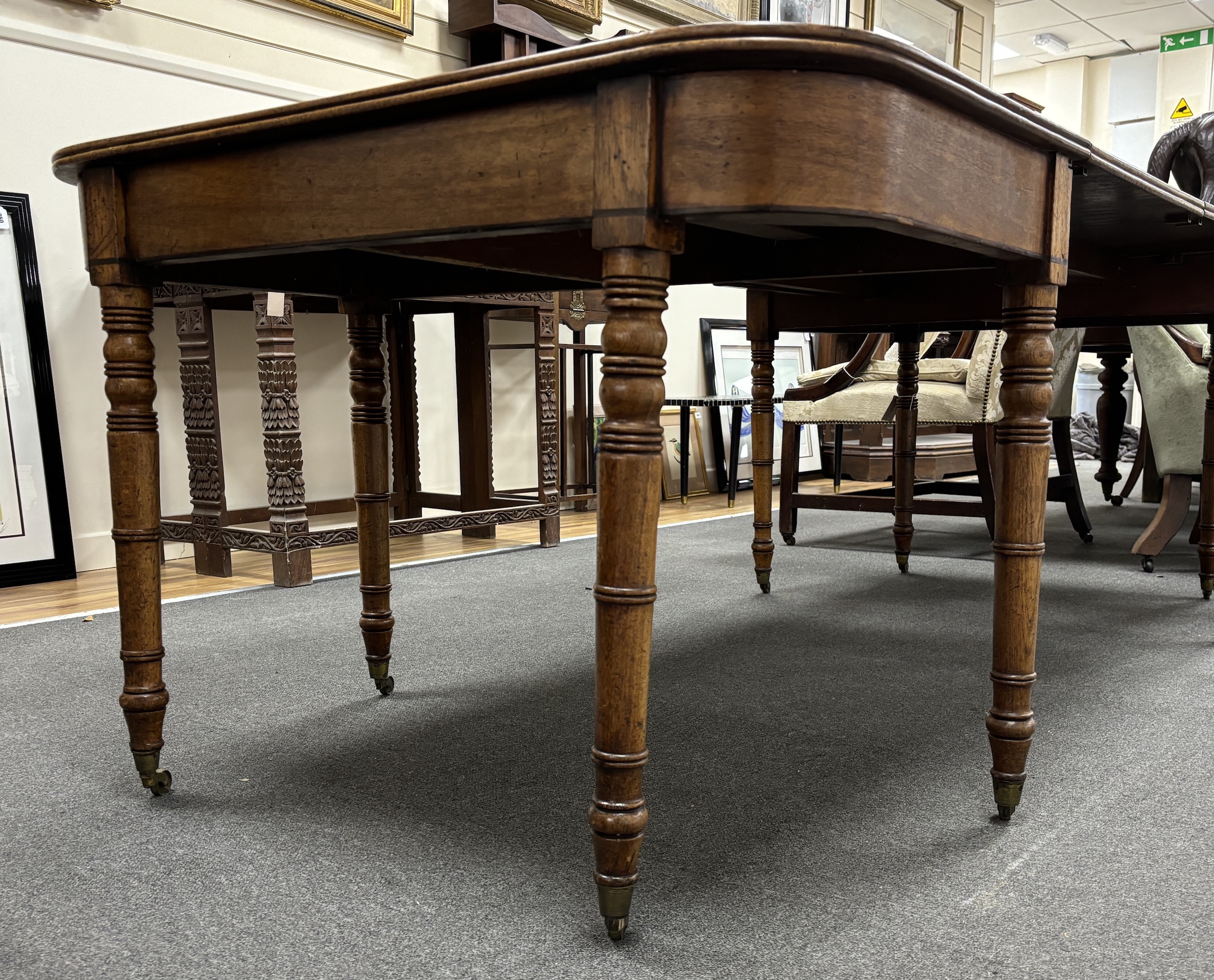 A Regency mahogany D end extending dining table, 220cm extended, depth 105cm, height 72cm